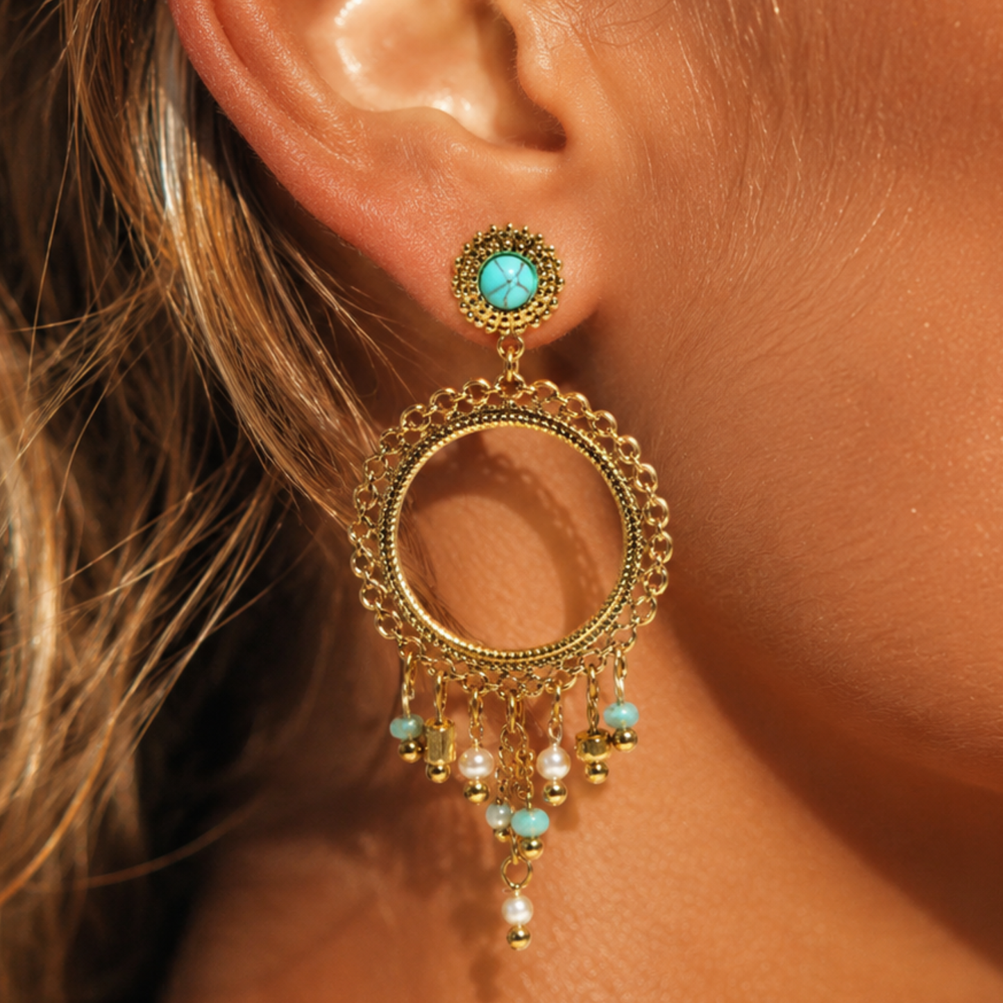 Boucles d'oreilles avec pierres bleues