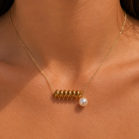 Collier perle ressort